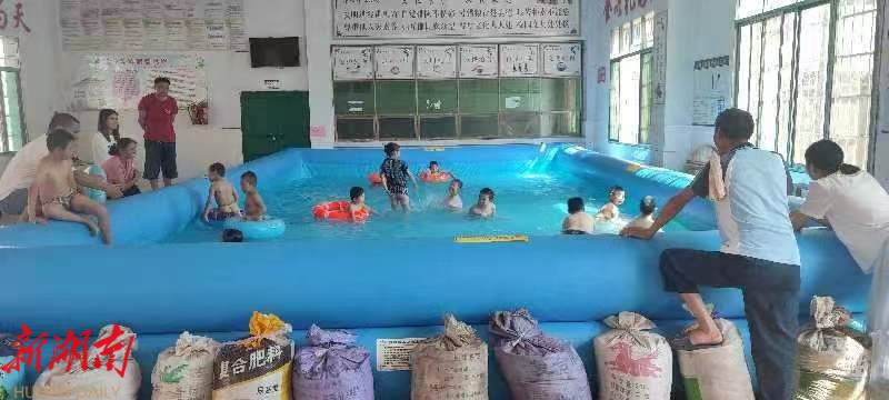 新寧： 20套“氣墊式”游泳池成孩子們暑假樂園_邵陽頭條網